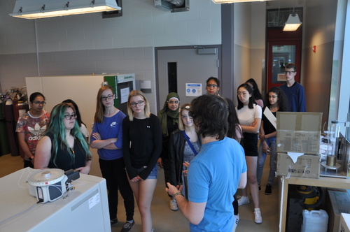 Michael Snowdon leading a group of high school students through the Bioproducts Facility