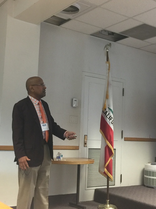 Professor Mohanty giving a keynote presentation at the 24th BEPS Annual Meeting.