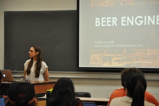Alexis Wagner giving a guest lecture to undergraduate students
