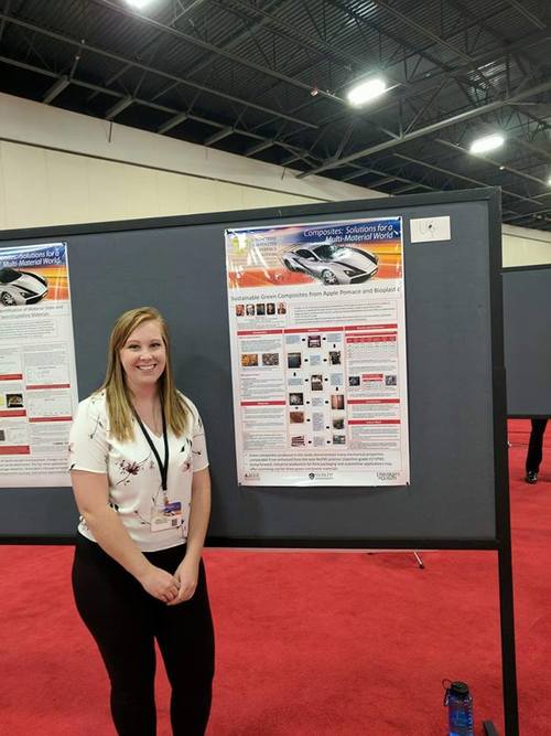 Maisyn Picard standing in front of her SPE ACCE poster.