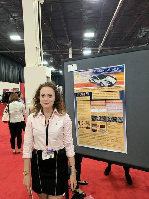 Ally Gowman standing in front of her SPE ACCE poster.